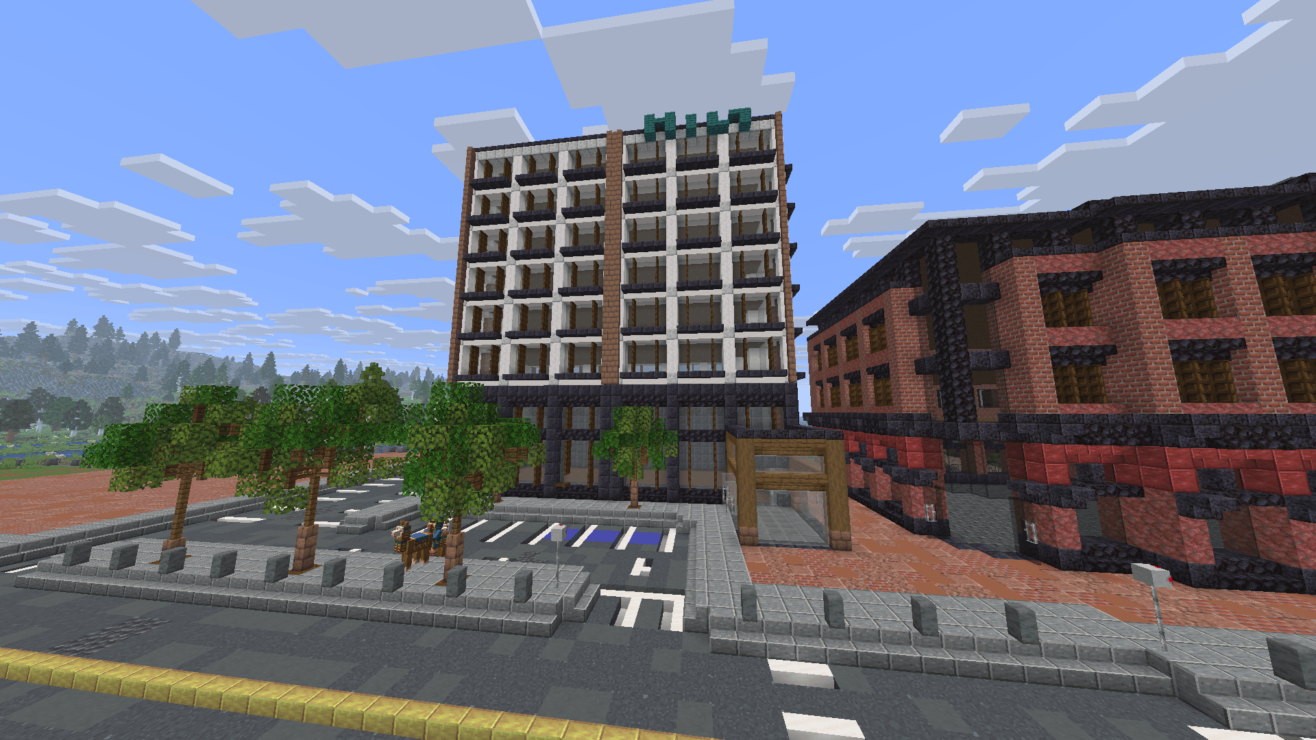 A modern player-built Minecraft city with apartments, brick buildings, roads, and sidewalks.