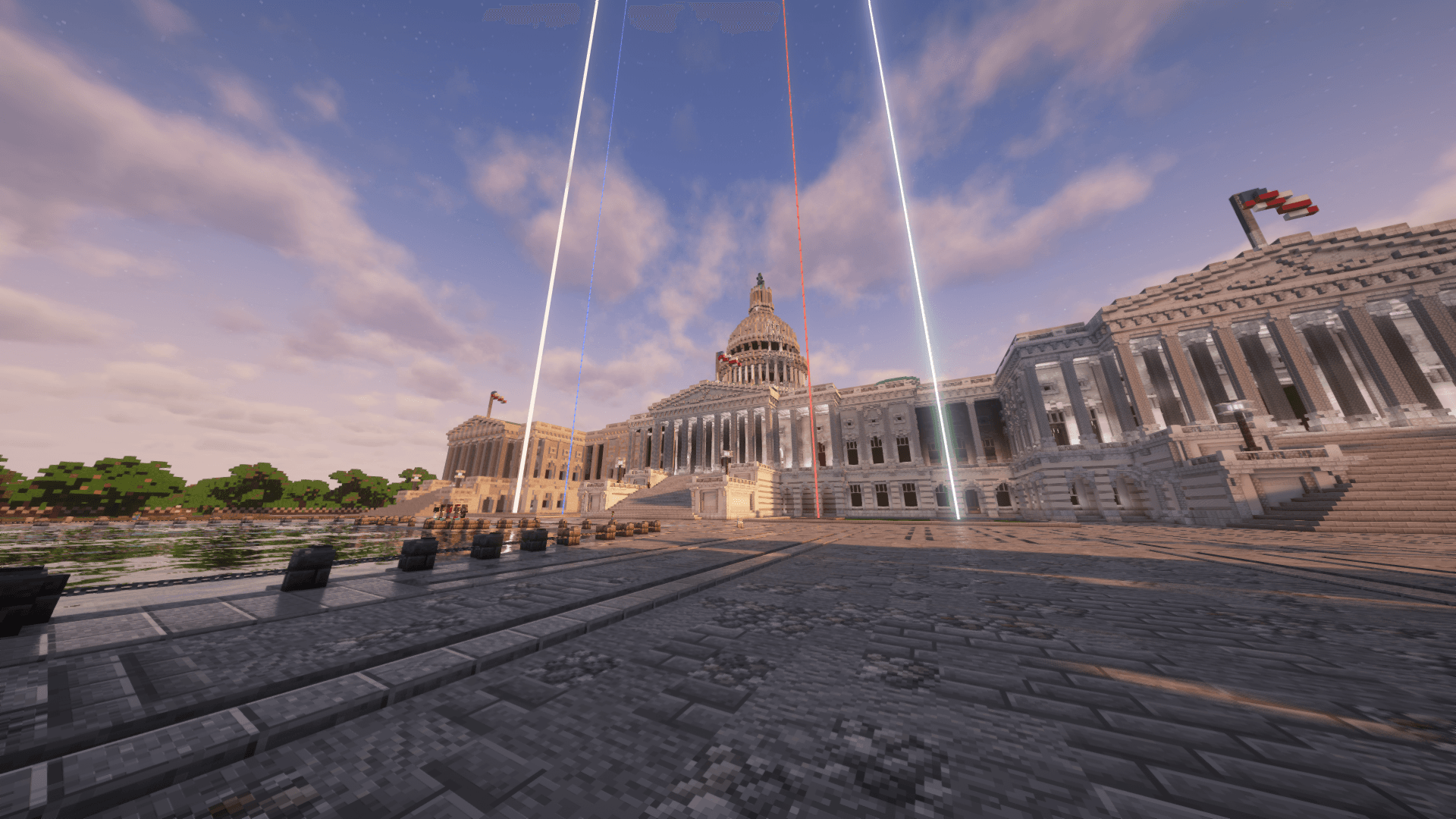 A Minecraft recreation of the United States Capitol with beacon beams rising into the sky.